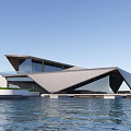 Modern Geometric Waterfront Building With Glass Curtain Wall Blue Sky And Water Surface