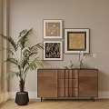Walnut Wood Dresser With Palm Plant Framed Artworks And Vases In Modern Room