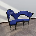 Blue Two Seat Leisure Chair With Unique Curved Design Black Frame And Wooden Floor Background