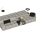 Beige Tufted Sectional Sofa With Black Cushions Floor Lamp And Side Table