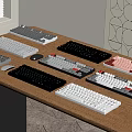 Multiple Computer Keyboards In Various Colors And Styles On Wooden Desk 3d model