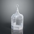 White Birdcage With Delicate Openwork Structure And Hexagonal Base On Reflective Surface