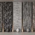 Diverse Textured Stone Cultural Wall Design With Various Natural Patterns And Decorative Spheres