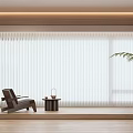 White Vertical Blinds In Modern Living Space With Armchair Side Table And Potted Plant