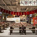 Traditional Chinese Restaurant Interior With Red Banners Wooden Tables And Benches
