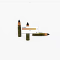 Three Green Ammunition Bullets With Black Tips On White Background
