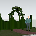 Greyst House Green Arched Main Entrance Gate With Decorative Pillars And Brick Path