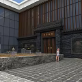 Industrial Interior Space Featuring Circular Stone Wall With Golden Statue And Green Plants