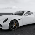White Sports Car With Sleek Design Driving On Open Road Scenic Background
