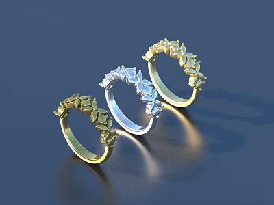 Stylish Leaf Shaped Rings With Gold Silver Tone Arranged In Row On Reflective Surface 3d model