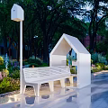 White Landscape Bench With Roofed Structure In Garden With Green Plants And Trees