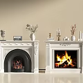 White Classic Ornate Fireplace With Decorative Items Vases Candle Holders And Burning Fire