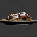 Loaded Fries Topped With White Sauce Red Seasoning And Beans On White Oval Plate