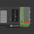 Portable Electronic Device With Gray Green Design Buttons And Connection Ports