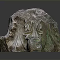 Decorative Stone Carving Ornament Featuring Intricate Floral Patterns And Textured Details