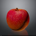 Fresh Shiny Red Apple With White Spots On Dark Reflective Surface