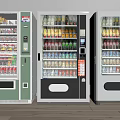Three Different Colored Refrigerated Vending Machines With Beverages And Snacks Interior