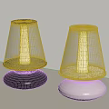 Two Modern Table Lamps With Black And Silver Bases And White Shades
