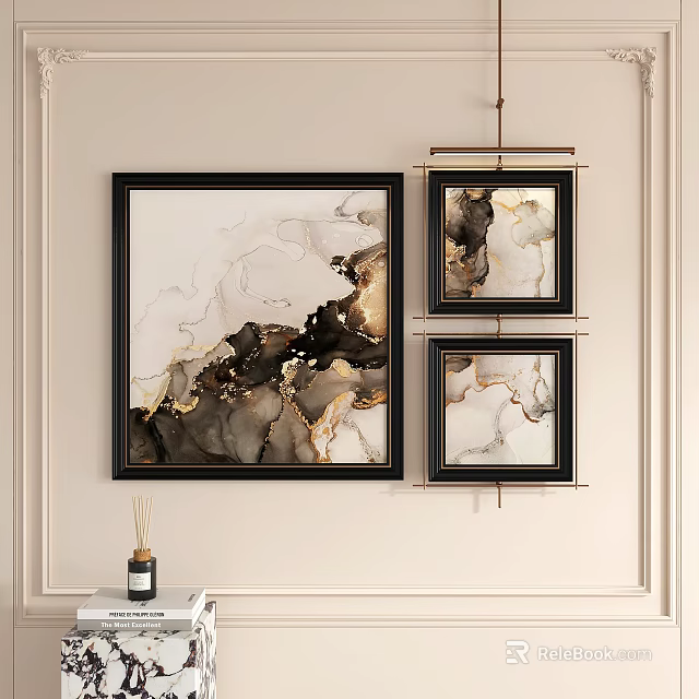 Black Framed Abstract Paintings with Black White and Gold Tones Hanging on Light Colored Wall 3d model 