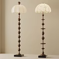 Elegant Floor Lamps With Spiral Bases And White Lampshades Featuring Lace Detail