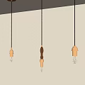 Three Amber Glass Bell Shaped Pendant Lights Hanging From Ceiling Illuminated Warm Modern Interior