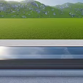 Residential Building With Glass Skylight Overlooking Green Grassland And Mountain Range