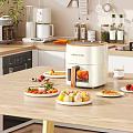 White Air Fryer On Kitchen Countertop With Various Healthy Foods And Snacks