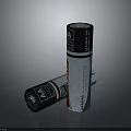 Silver Cylindrical Batteries With Black Labels Standing And Lying On Reflective Surface 3d model