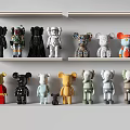 Colorful Decorative Figurine Collection on White Shelves with Various Styles and Designs