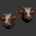 Two Brown And White Cow Head Models With Pink Noses And Big Ears