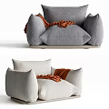 Stylish Gray and Beige Single Sofa with Orange Blanket for Cozy Living Space Design