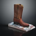Classic Brown Leather Cowboy Boots Placed On Neat Stack Of Colorful Banknotes