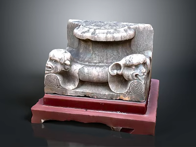 Ancient Stone Carved Capital With Decorative Animal Heads On Red Base 3d model
