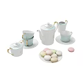Elegant Tea Set With Teapot Cups Saucers Milk Jug And Macarons 3d model