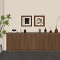Wooden Entryway Console Table with Vertical Slat Design Decorative Vases Framed Artworks and Potted Plant