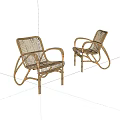 Two Modern Rattan Lounge Chairs With Curved Frame And Ergonomic Armrests