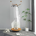 Contemporary Clothes Rack with White Garments Small Table Plant Books and Shoes Near Gray Wall
