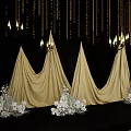 Elegant Floral Installation with Golden Conical Drapes White Flowers and Hanging Decorations on Black Background