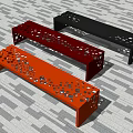 Modern Landscape Seats with Perforated Design in Vibrant Orange Red and Black on Striped Floor