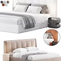 Modern Double Bed With Tufted Beige Headboard White Sheets Gray Blanket And Decorative Pillows