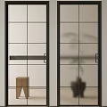 Modern Hinged Doors With Black Frame Glass Panel And Interior Plant View