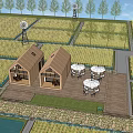 Rural Landscape with Golden Rice Fields Two Wooden Houses and Calm Pond
