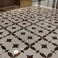 Modern Black and White Floor Design With Interlocking Geometric Tile Pattern