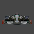 Silver and Green Formula 1 Race Car With PETRONAS INEOS Logos Aerodynamic Design