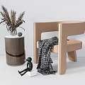 Modern Beige Leisure Chair With Black White Checkered Blanket And Wooden Side Table Decor