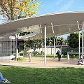 Modern Circular Pergola With White Pillars Wooden Floor And Curved Table Chairs On Green Lawn