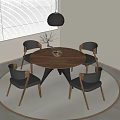 Round Wooden Dining Table Set With Four Black Chairs Wooden Legs And Decorative Ornament