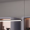 Modern Long Linear Pendant Light Hanging In Minimalist Interior With Grey Shelves And Decorative Items