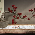 Bonsai Tree With Red Berries in Stone Pot on Wooden Table