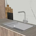 Stainless Steel Kitchen Sink with Modern Faucet on Countertop and Wooden Cutting Boards